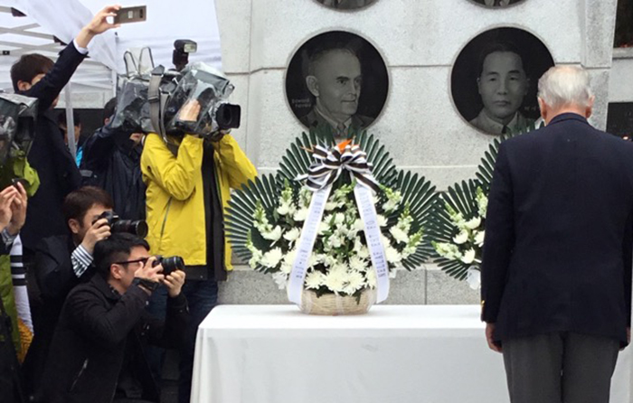 Burley pays tribute at the Hungnam Evacuation Memorial on Geojedo Island near Busan. (Ned Forney)
